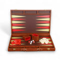 Open cognac brown leatherette backgammon set with red and white checkers, dice, and felt-lined cups.