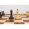 Weighted ebonized and natural boxwood Dubrovnik pawns showing the wide base and sleek collar.