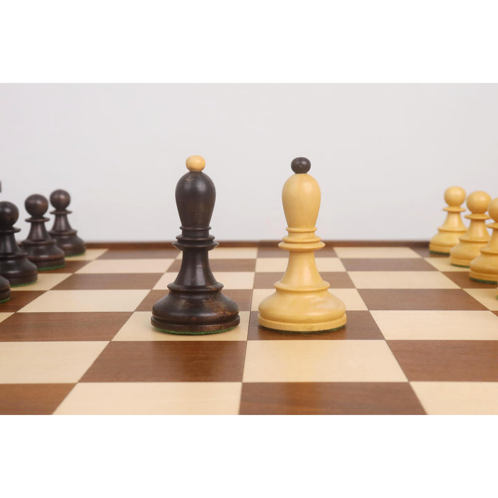 Weighted ebonized and natural boxwood Dubrovnik pawns showing the wide base and sleek collar.