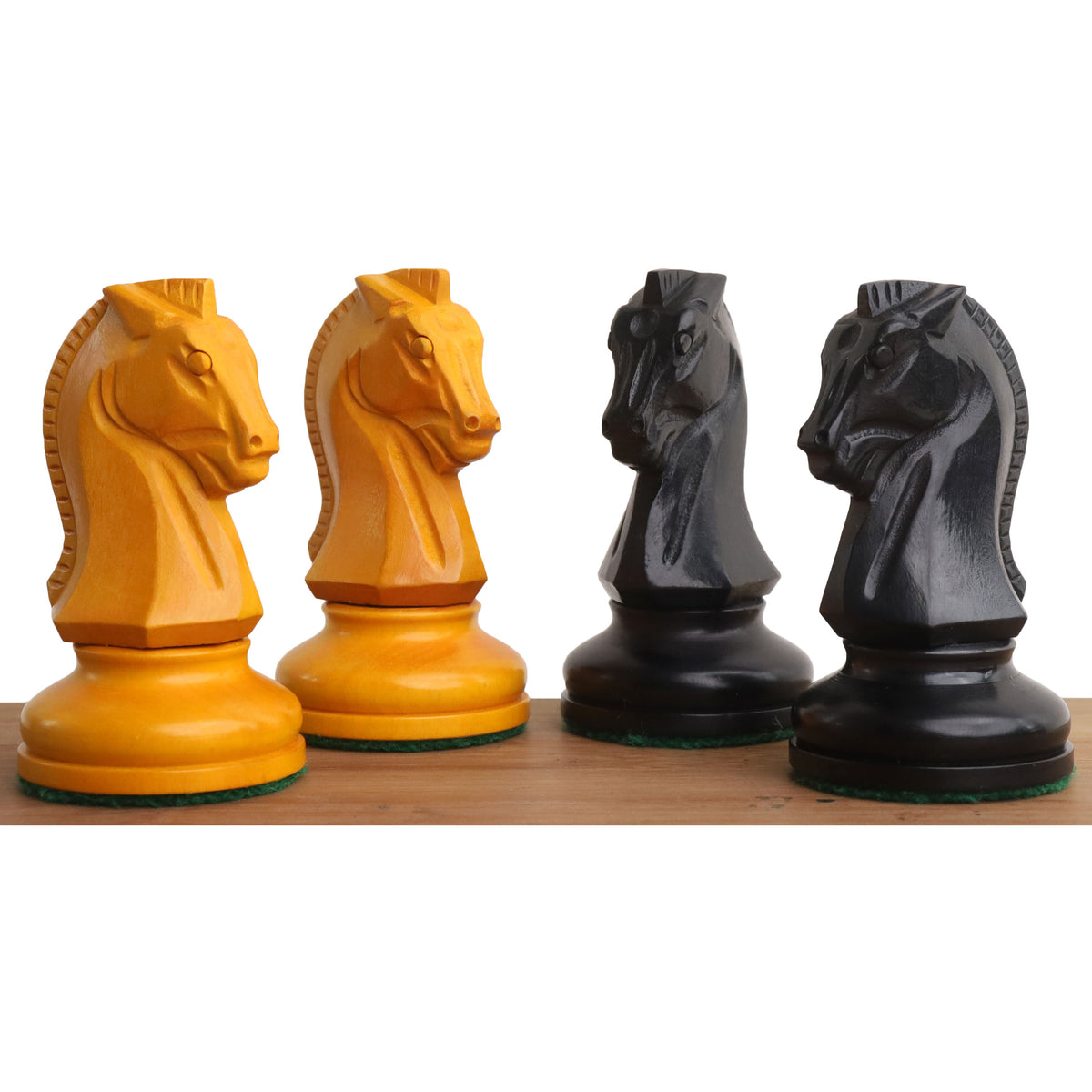 Hand-carved Dubrovnik style Knights in antiqued boxwood and ebonized boxwood finishes.