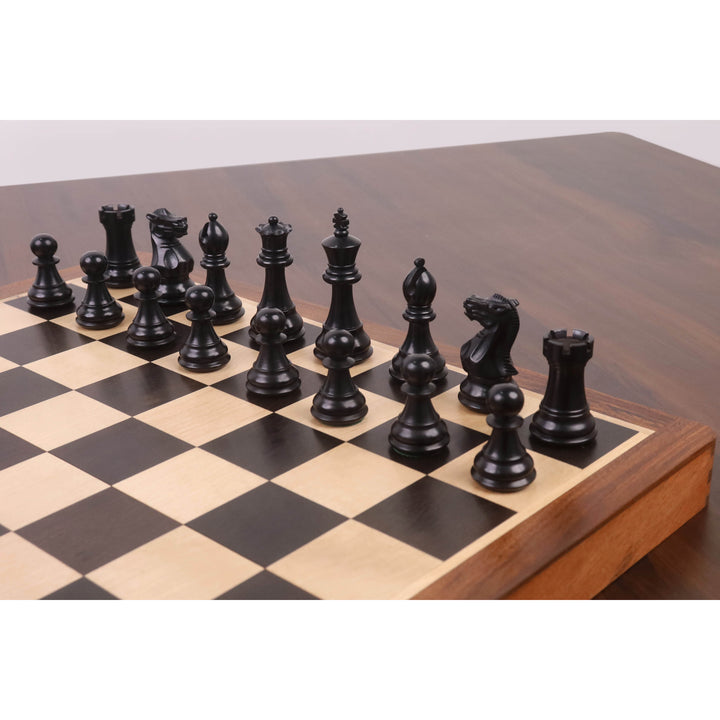 Polished ebonized boxwood magnetic chess pieces positioned on a premium 16 inch folding travel board.