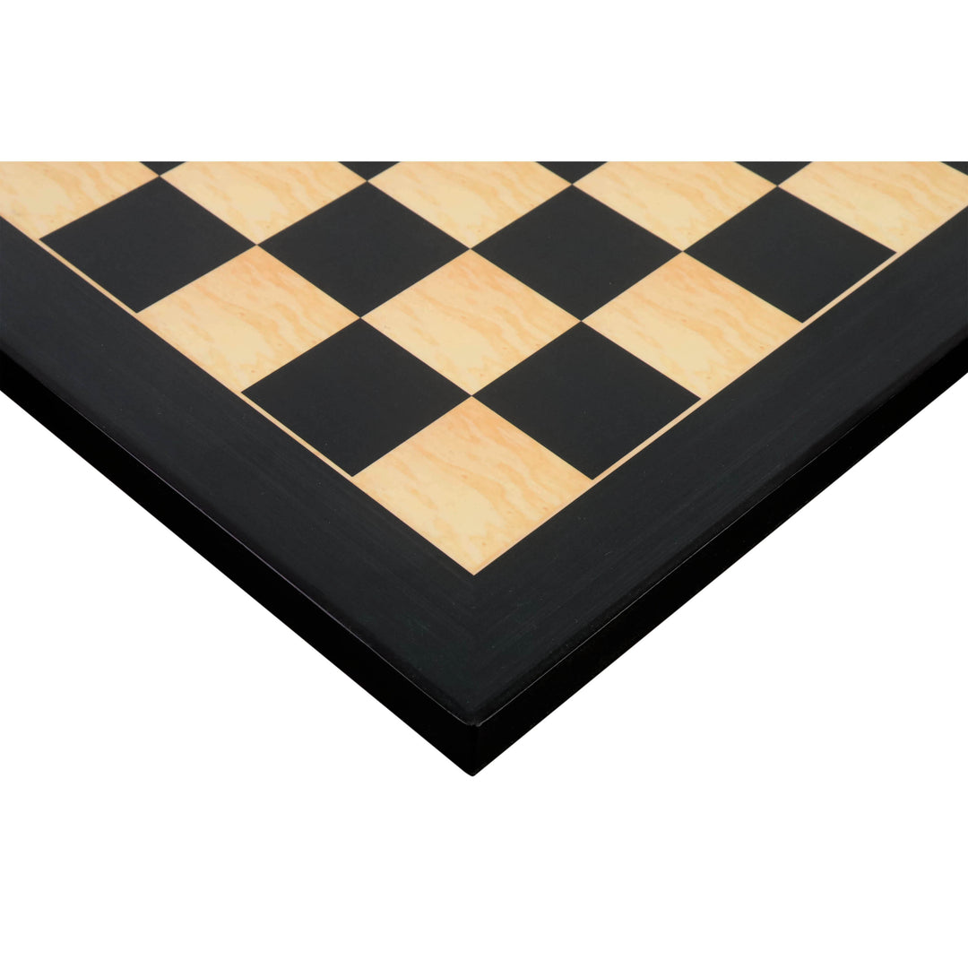 Close-up of a 17 inch ebony and maple wood printed chess board corner with a smooth gloss finish.