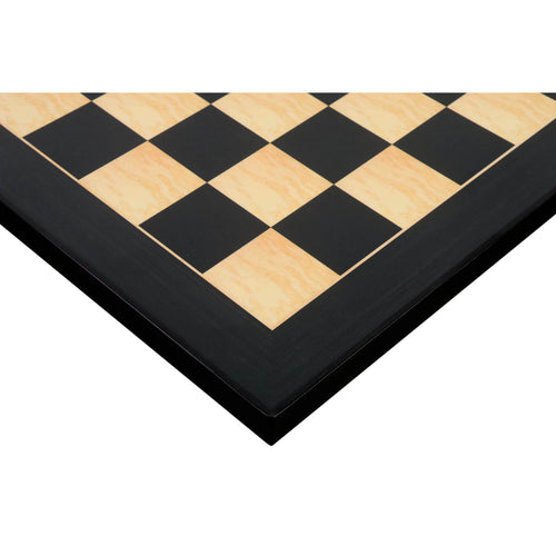 Close-up of a 17 inch ebony and maple wood printed chess board corner with a smooth gloss finish.