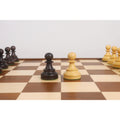 Pair of Dubrovnik bishops in ebonized and natural boxwood with iconic opposite-colored ball finials.