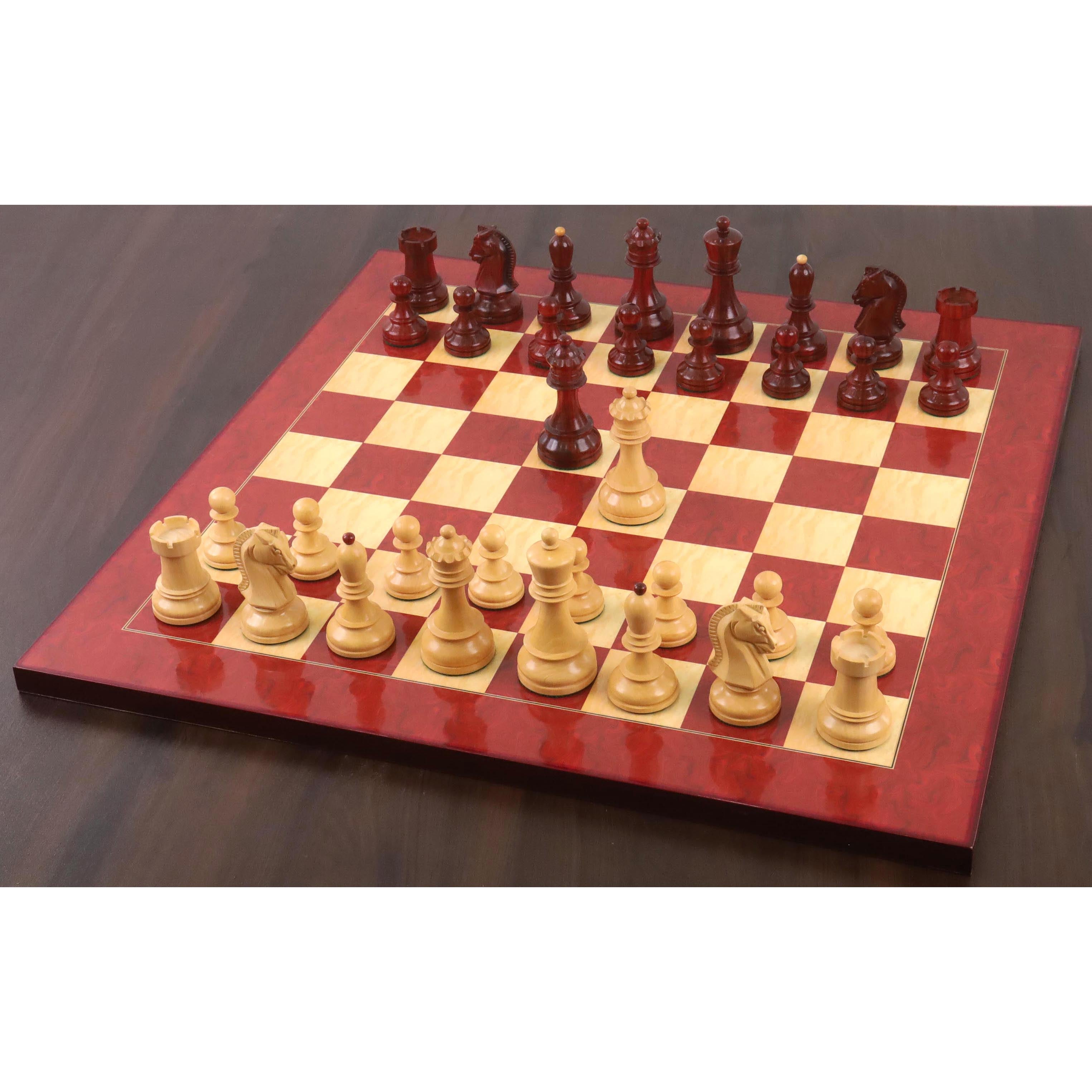 Full Fischer Dubrovnik chess set in Bud Rosewood and Boxwood arranged on a gloss chess board.