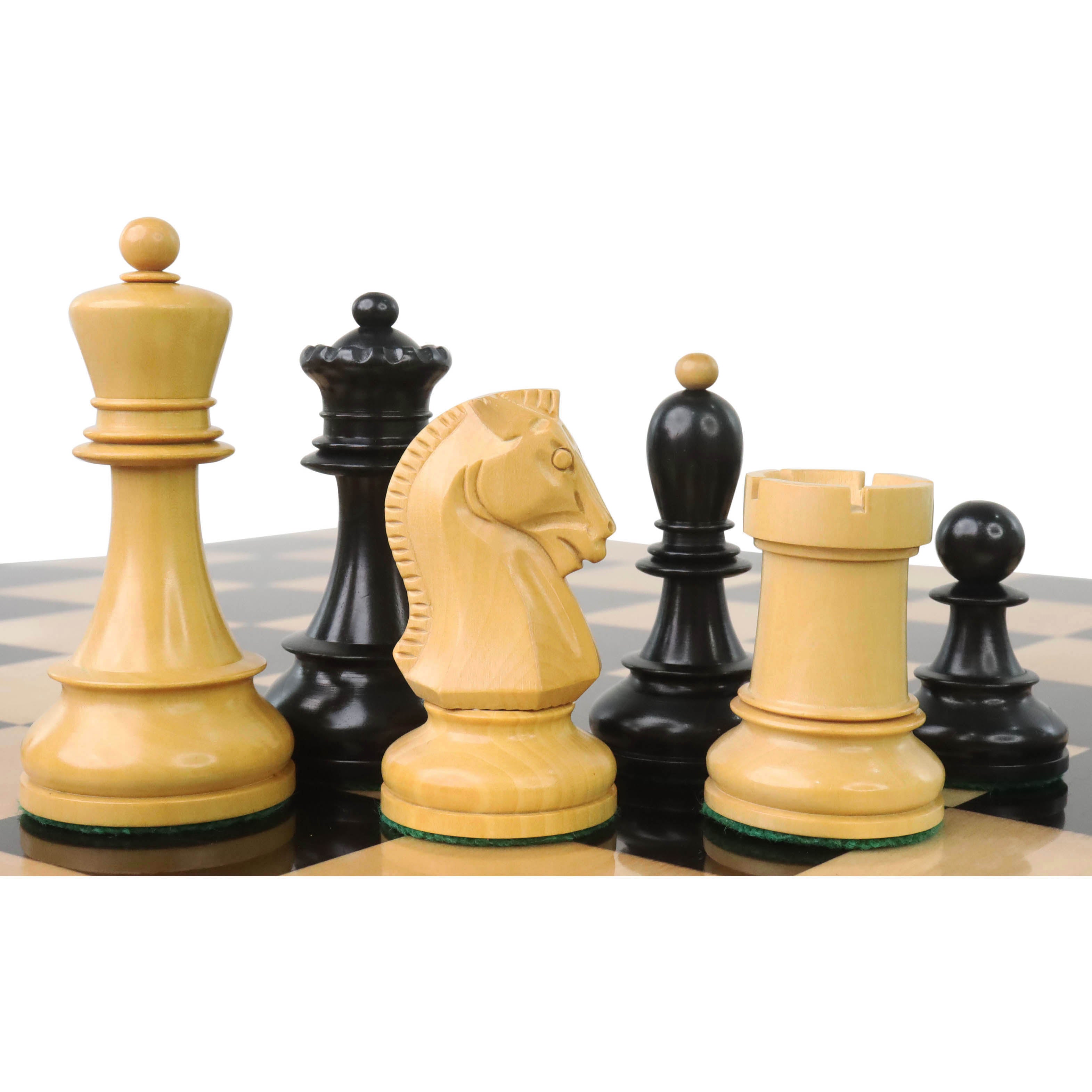 Ebony and boxwood Fischer Dubrovnik chess pieces arranged on a luxury wooden board.