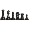 Low-angle view of a weighted ebony rook piece from the Fischer Dubrovnik chess series.