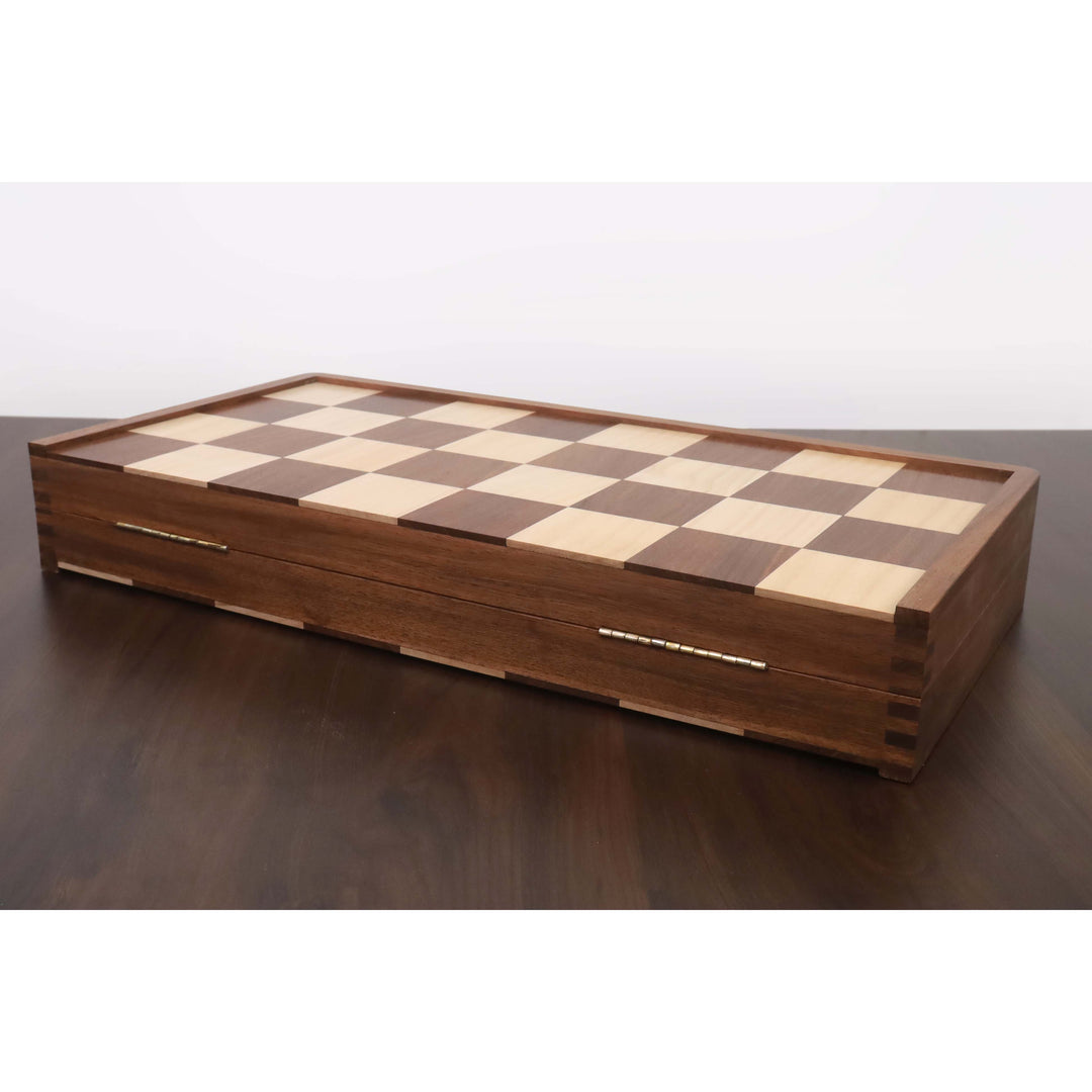 Durable brass hinges on the golden rosewood and maple folding chess board in its closed position.