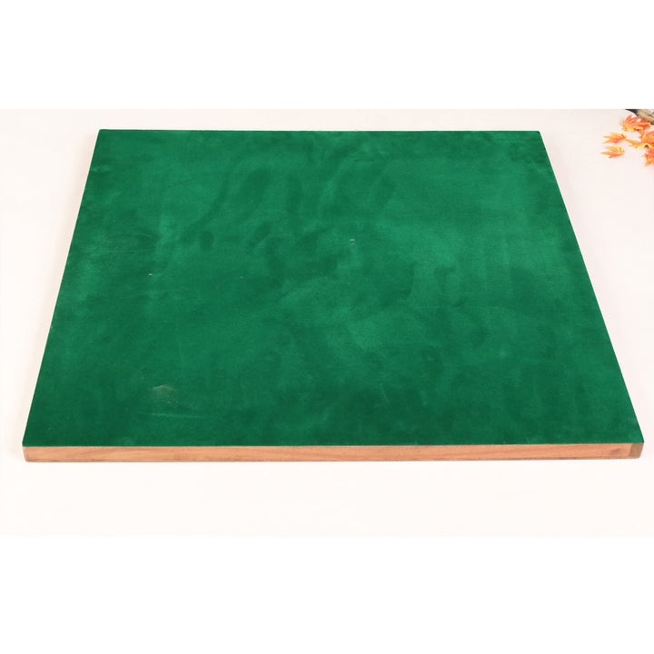 Green baize backing of the handcrafted 22.5-inch Ebony and Acacia wood chess board for enhanced table protection and stability.