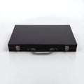 Closed 18-inch luxury backgammon set in a black briefcase style with silver-tone latches.