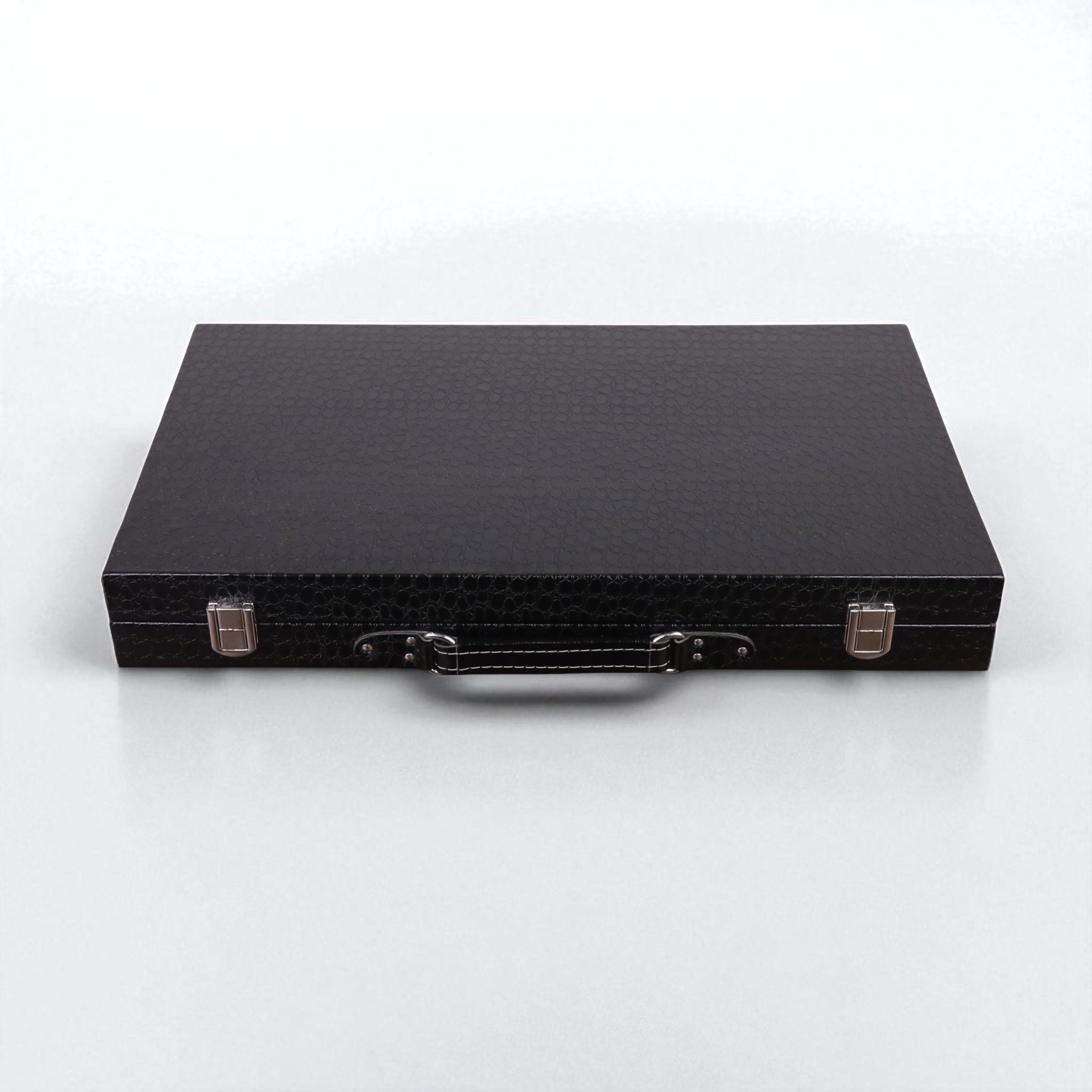 Closed 18-inch luxury backgammon set in a black briefcase style with silver-tone latches.
