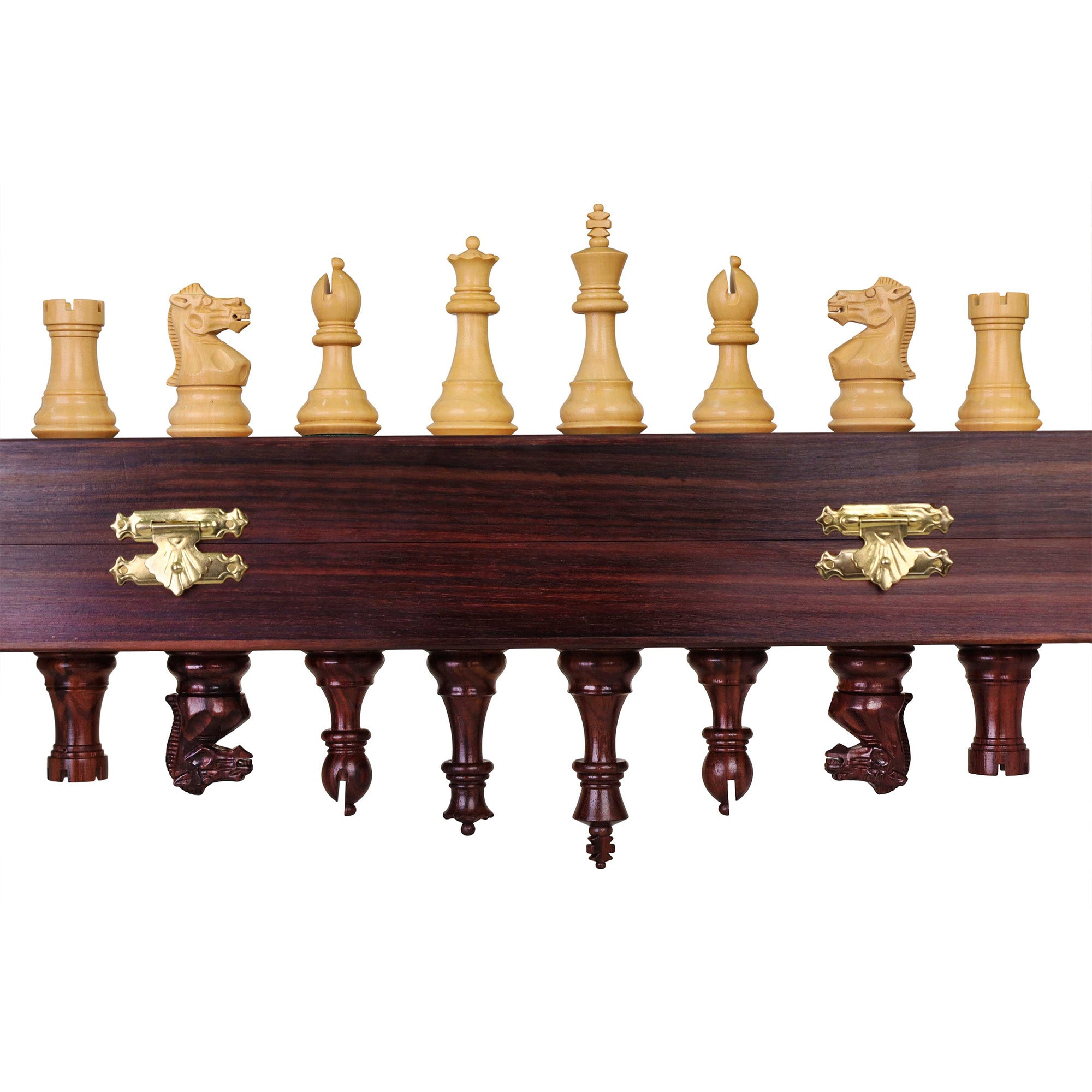 Rosewood and boxwood magnetic chess pieces showcased against a dark wood board edge.