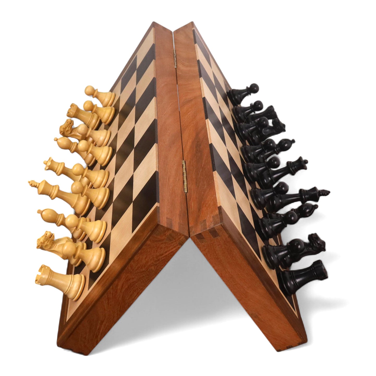 Magnetic 16 inch travel chess board demonstrating strong magnetism with pieces attached while tilted.