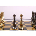 Sleek black and gold minimalist brass pawns from the luxury chess and table set.