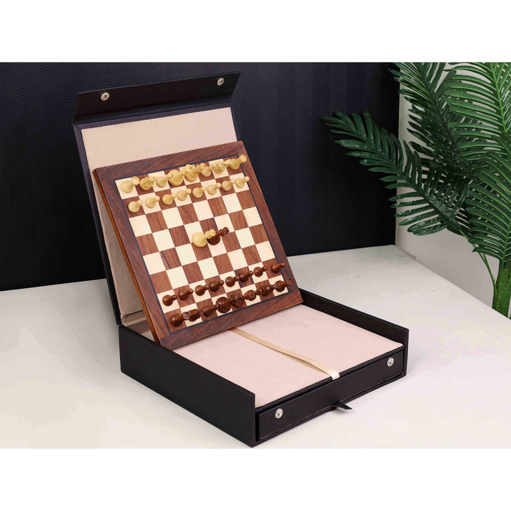 Minimalist magnetic chess set displayed vertically on a white table in a modern home office setting.