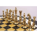Close-up of polished gold minimalist brass chess pieces highlighting their elegant modern design.