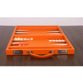 Front view of an open 18-inch orange backgammon travel set showing integrated handle and game setup.