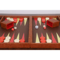 Detailed view of the interior playing field and two brown leatherette dice cups with red velvet lining.