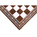 Exquisite white floral border inlay pattern detailed on the corner of a premium golden rosewood chess board.