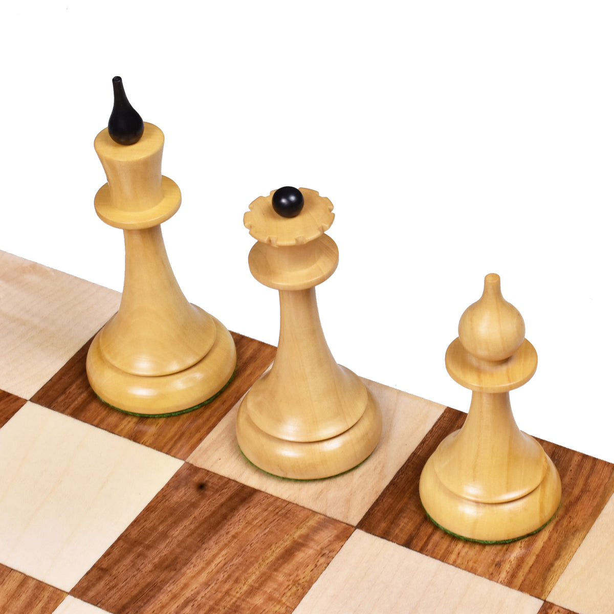 Close-up of natural boxwood King, Queen, and Bishop from the 1950s Soviet Latvian reproduction set.