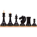 Complete set of ebonised boxwood Latvian reproduction chess pieces with iconic slender stems.