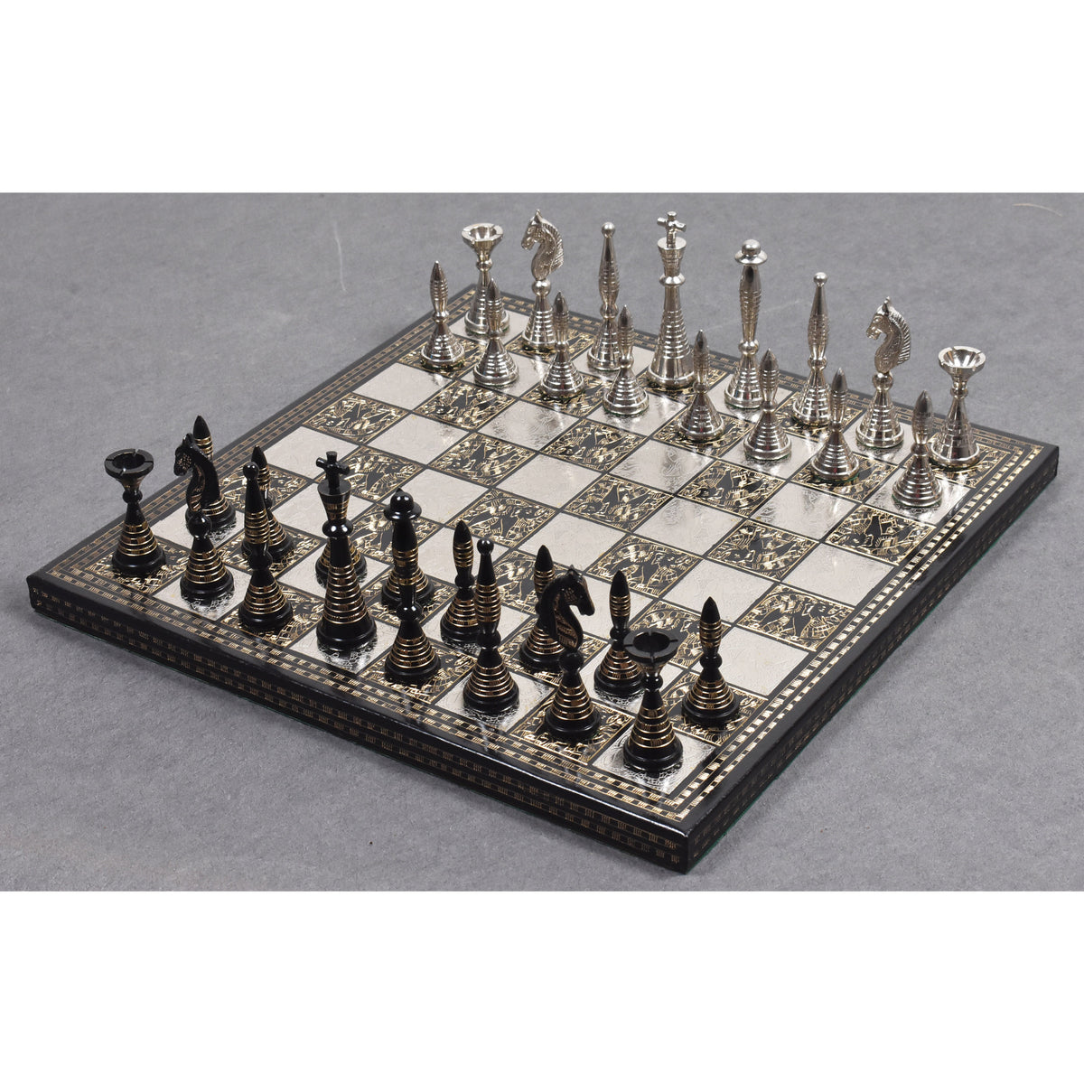 Complete 12-inch solid brass Warli tribal artwork luxury chess set and board.