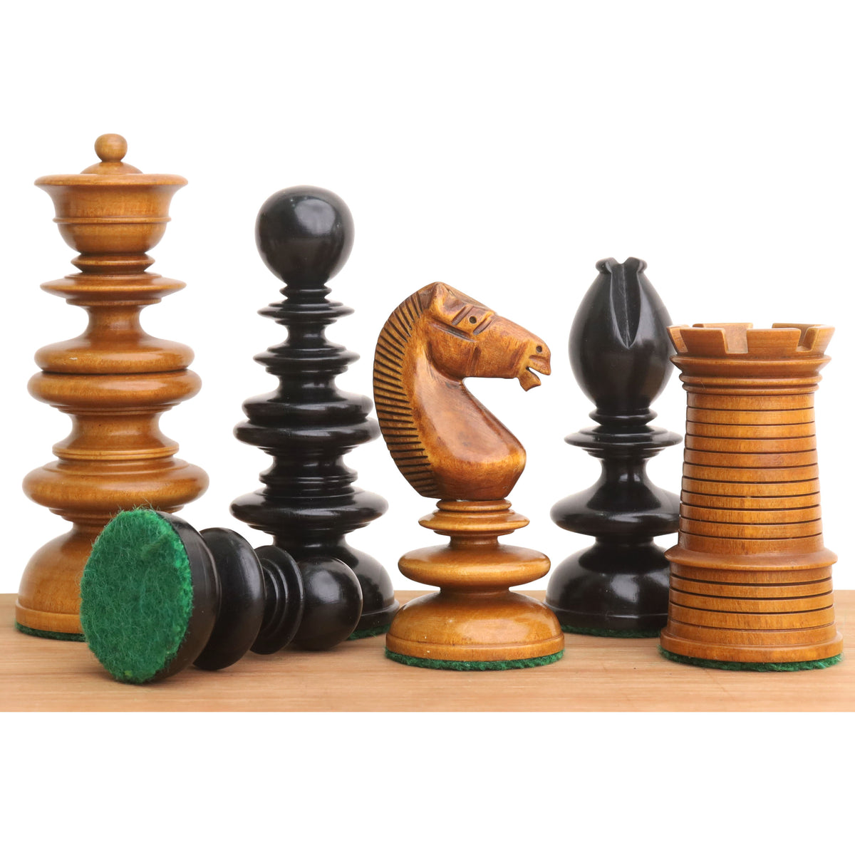 Close-up of St. John Pre-Staunton Calvert ebony and boxwood chess pieces.