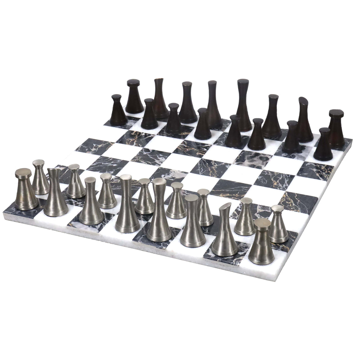 Tower series brass luxury chess pieces set up on a 15-inch black and white veined marble chessboard.