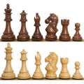 Full lineup of 4 inch Bridle Staunton luxury chess pieces in golden rosewood and light boxwood.