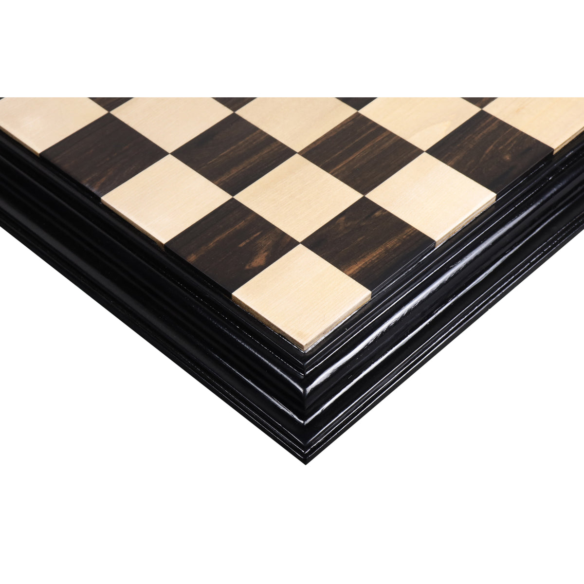 Hand-crafted ebony and maple luxury chess board with a carved border.