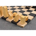 Close up of Lanier Graham geometric chess pieces in natural boxwood