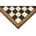 Close-up of a 21-inch Players Choice Ebony and Maple wood chess board corner showing white algebraic notations.