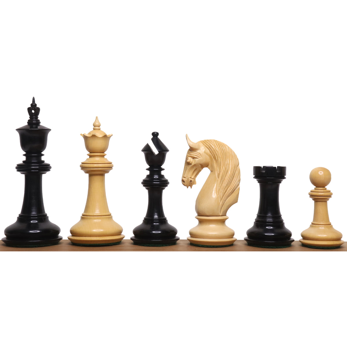 Luxury 4.6-inch Staunton chess pieces in ebony and boxwood arranged in a line.