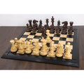 6.1 inch Mammoth Luxury Staunton chess set fully set up on a board.