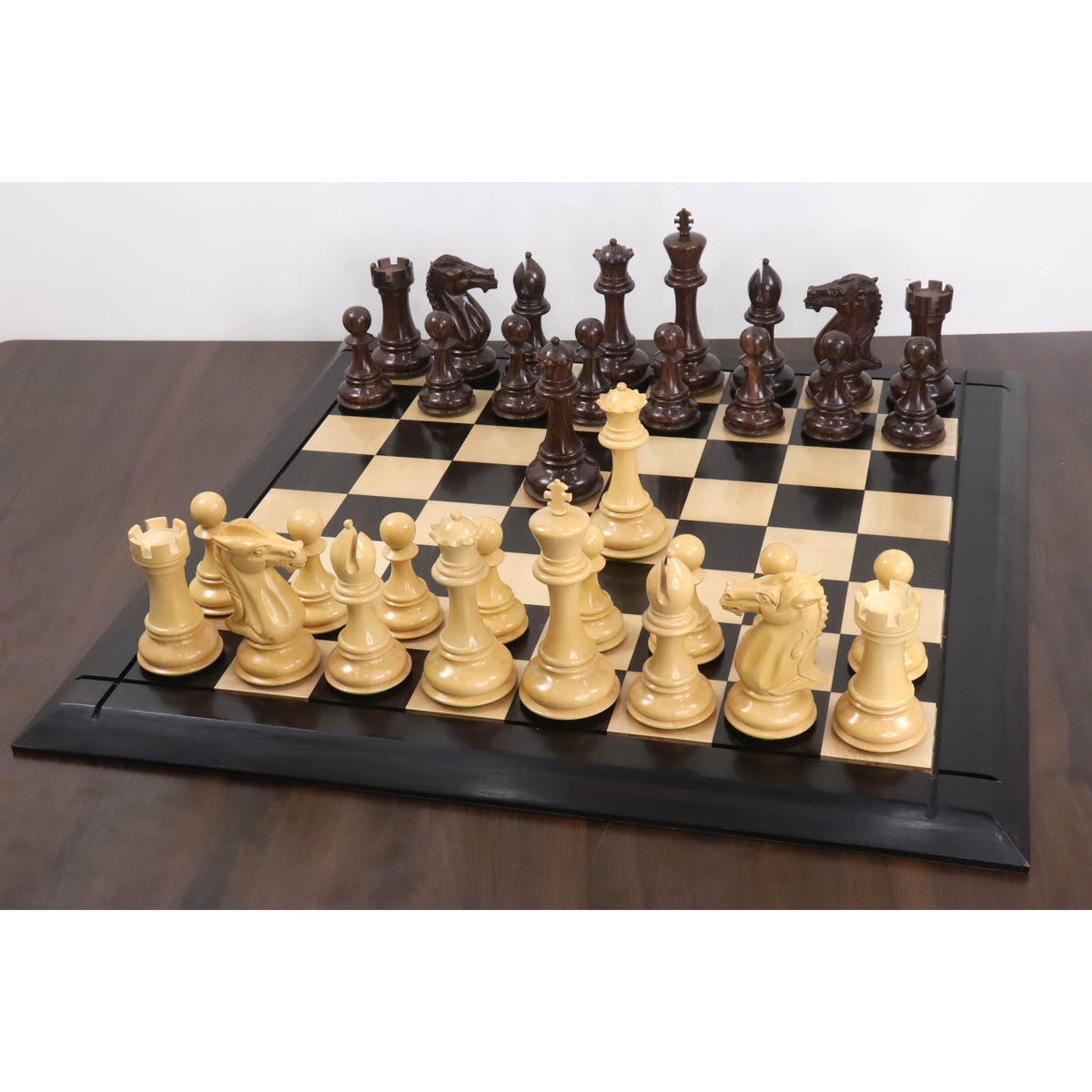 6.1 inch Mammoth Luxury Staunton chess set fully set up on a board.