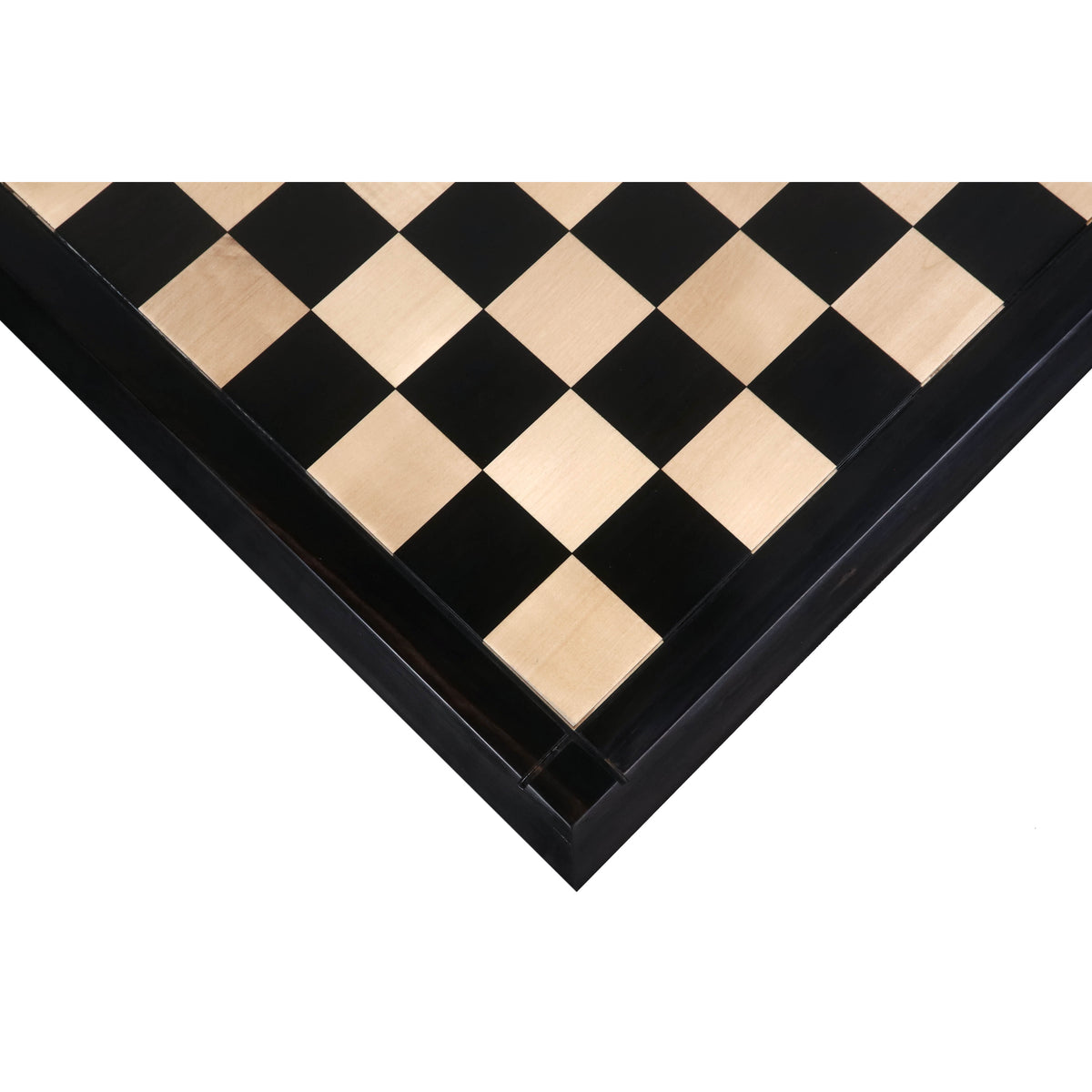Diagonal view of the premium ebony and maple wood squares on a Drueke style chessboard corner.