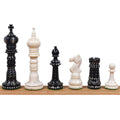 Black and white British series hand-carved camel bone chess pieces lineup.