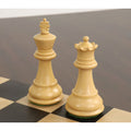Natural boxwood Staunton King and Queen chess pieces showing intricate carvings and polished finish.