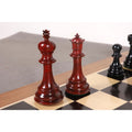 Elegant bud rosewood king and queen pieces from the Prestige Luxury Staunton set on a wooden board.