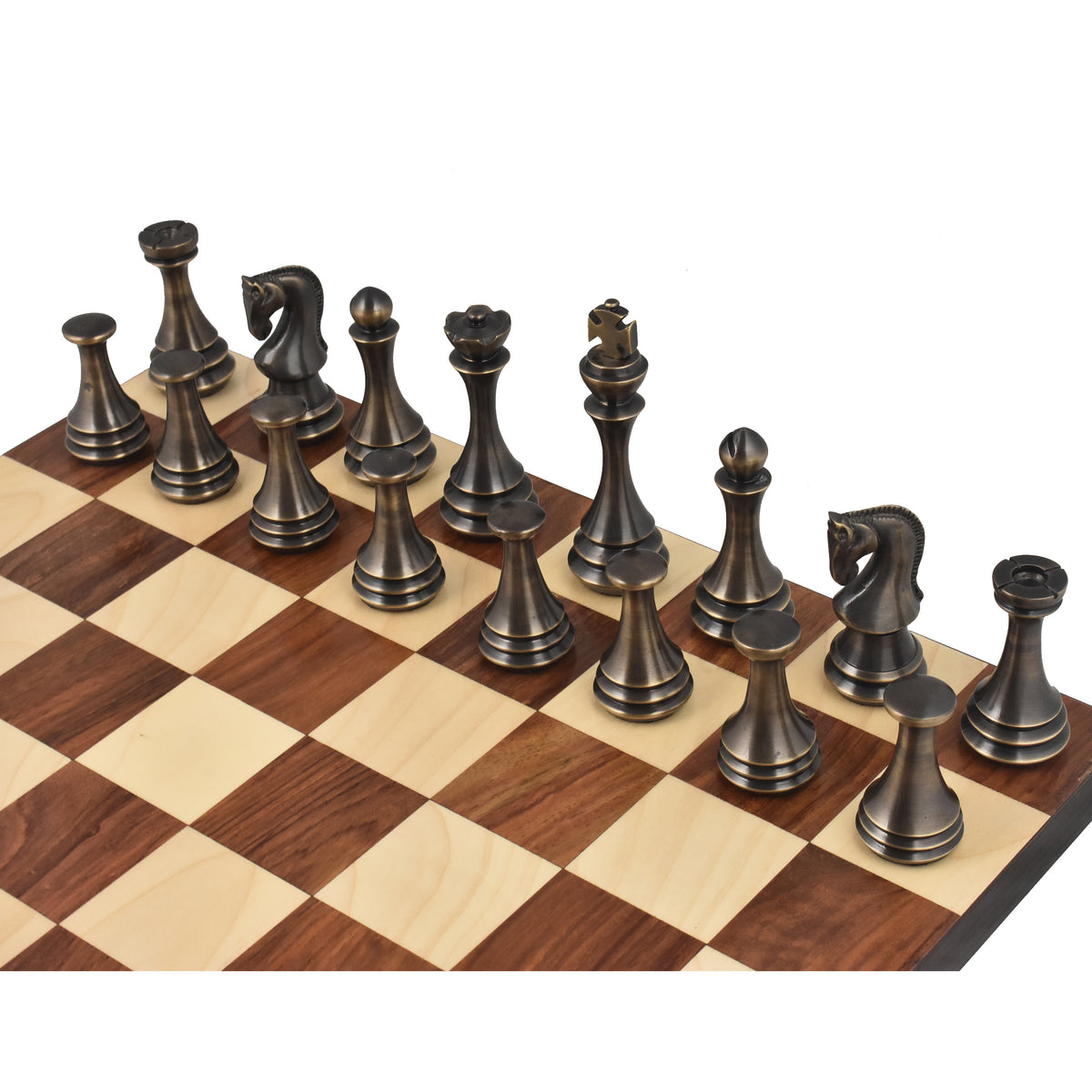Antique brass metal luxury chess pieces arranged on a wooden chessboard.
