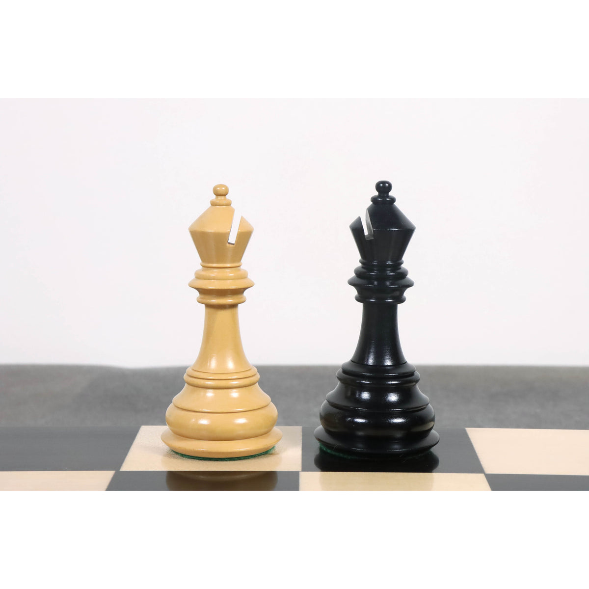 Elegant ebony and boxwood bishop chess pieces from the Rare Columbian luxury collection.