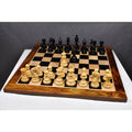 Full 4.3" Napoleon luxury Staunton chess pieces set up on a high-gloss premium wooden chessboard.