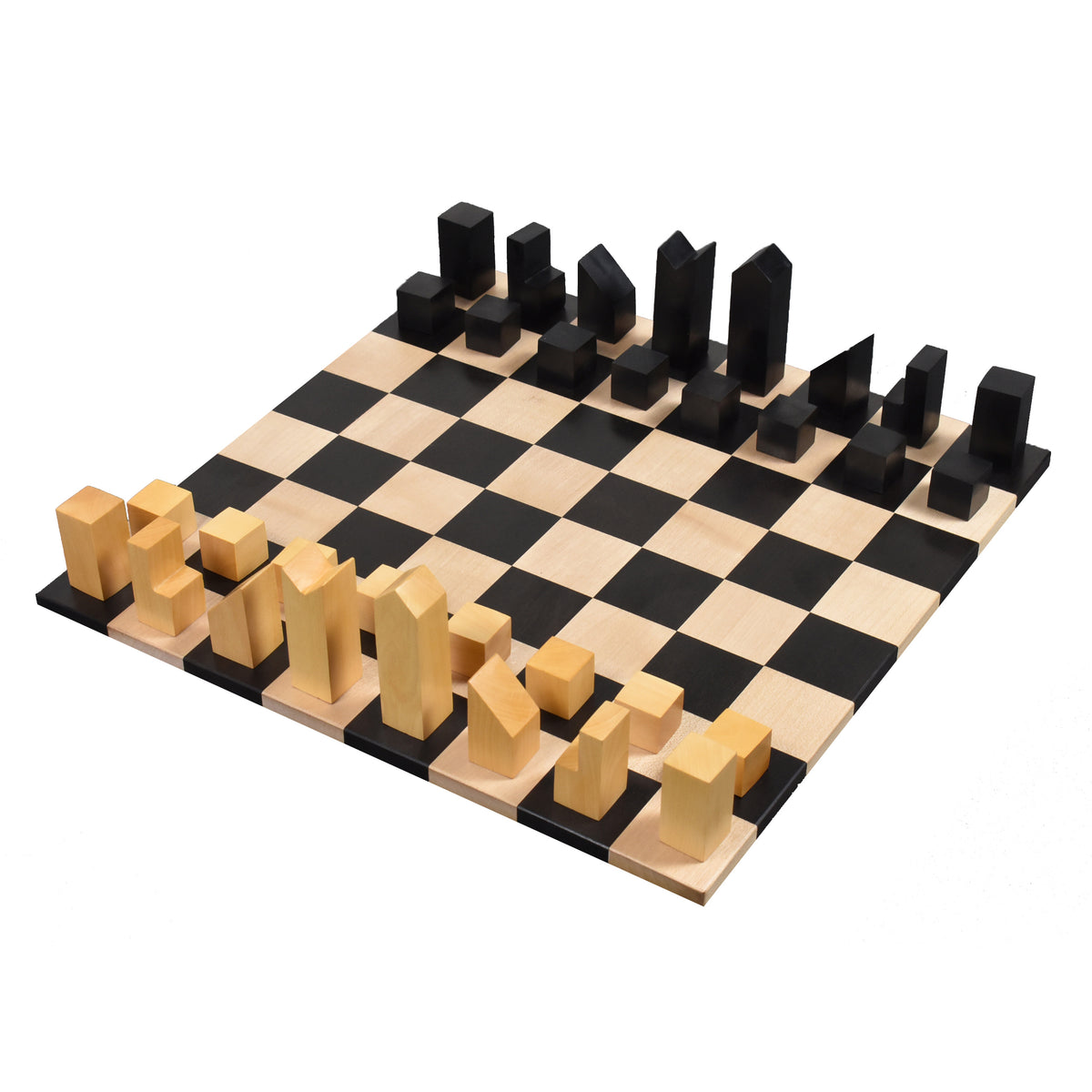 A full view of the Lanier Graham abstract chess set in ebonised boxwood on a maple board, isolated on white.