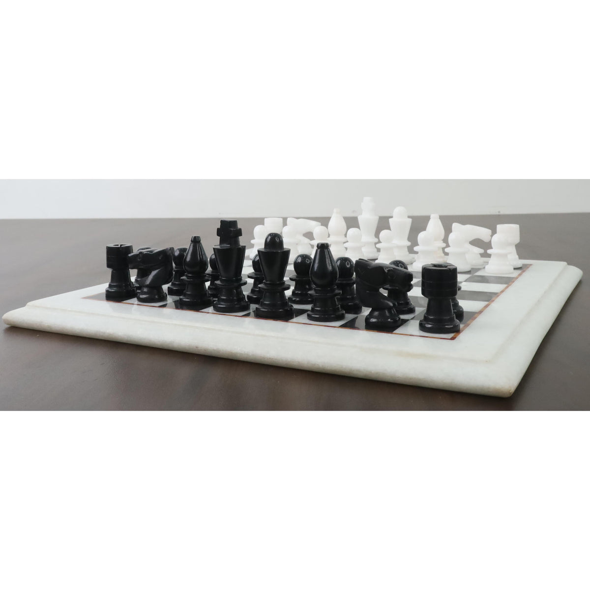 Complete 12-inch handcarved marble stone chess set in black and white.