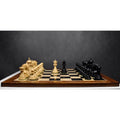 Complete Dragon Luxury Staunton chess set with opposing boxwood and ebony pieces arrayed for a game.