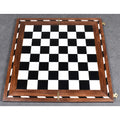 Overhead view of the 14 inch library series chess board showing the symmetric black and ivory checkered pattern.