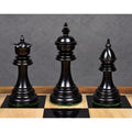 Polished ebony wood king, queen, and bishop pieces from the 4.4 inch Dragon Luxury Staunton collection.