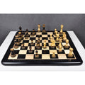 High-angle shot of the 3.9 inch Parker Staunton lacquer finish chess pieces on a board.