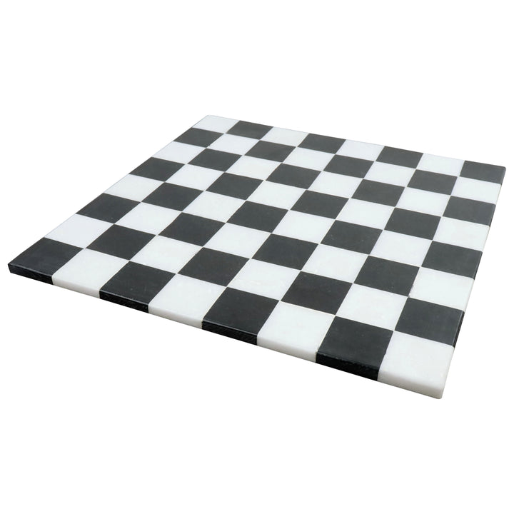Minimalist 15 inch borderless marble chess board with solid black and white stone squares.