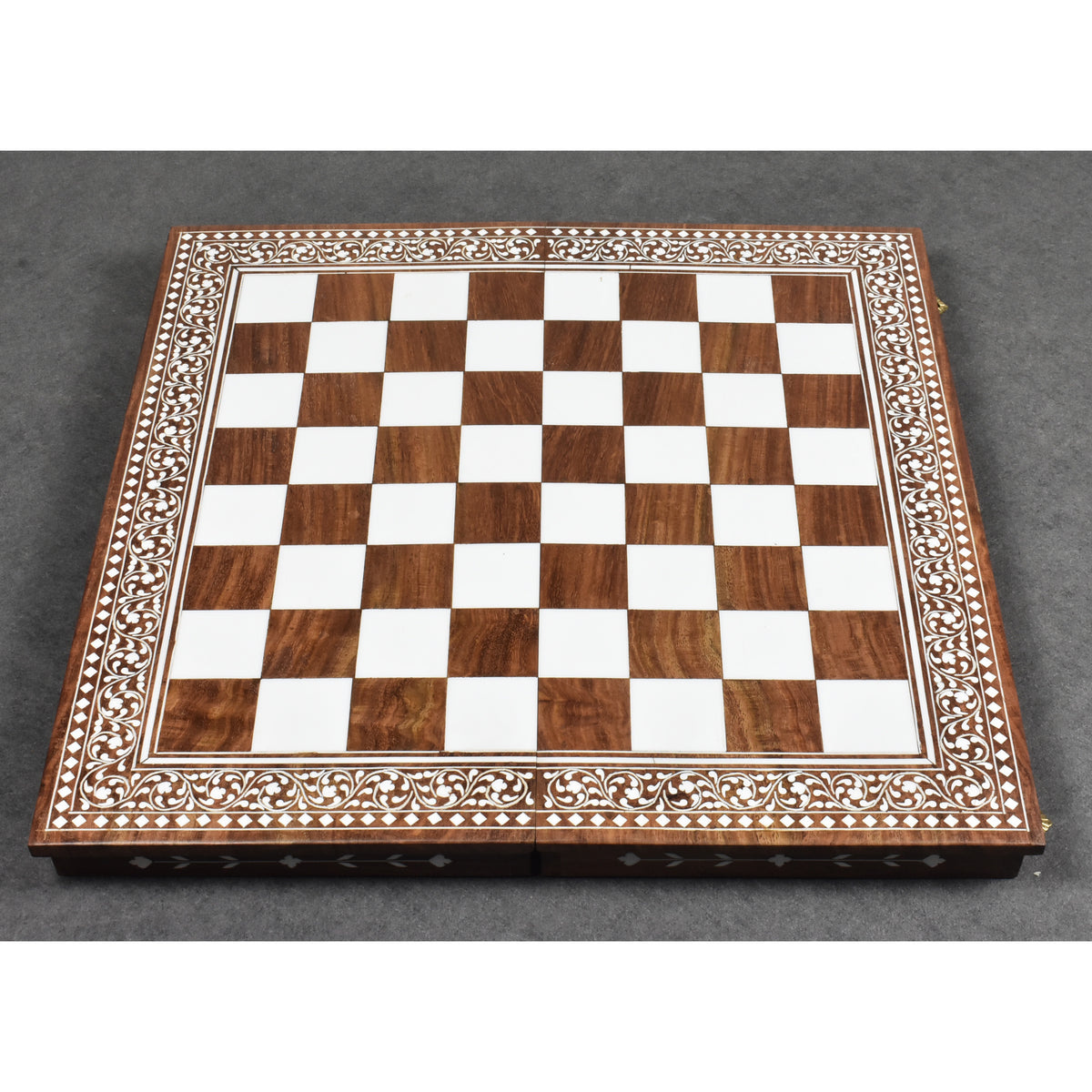Full view of a 15 inch folding chess board with golden rosewood and faux ivory inlaid squares.